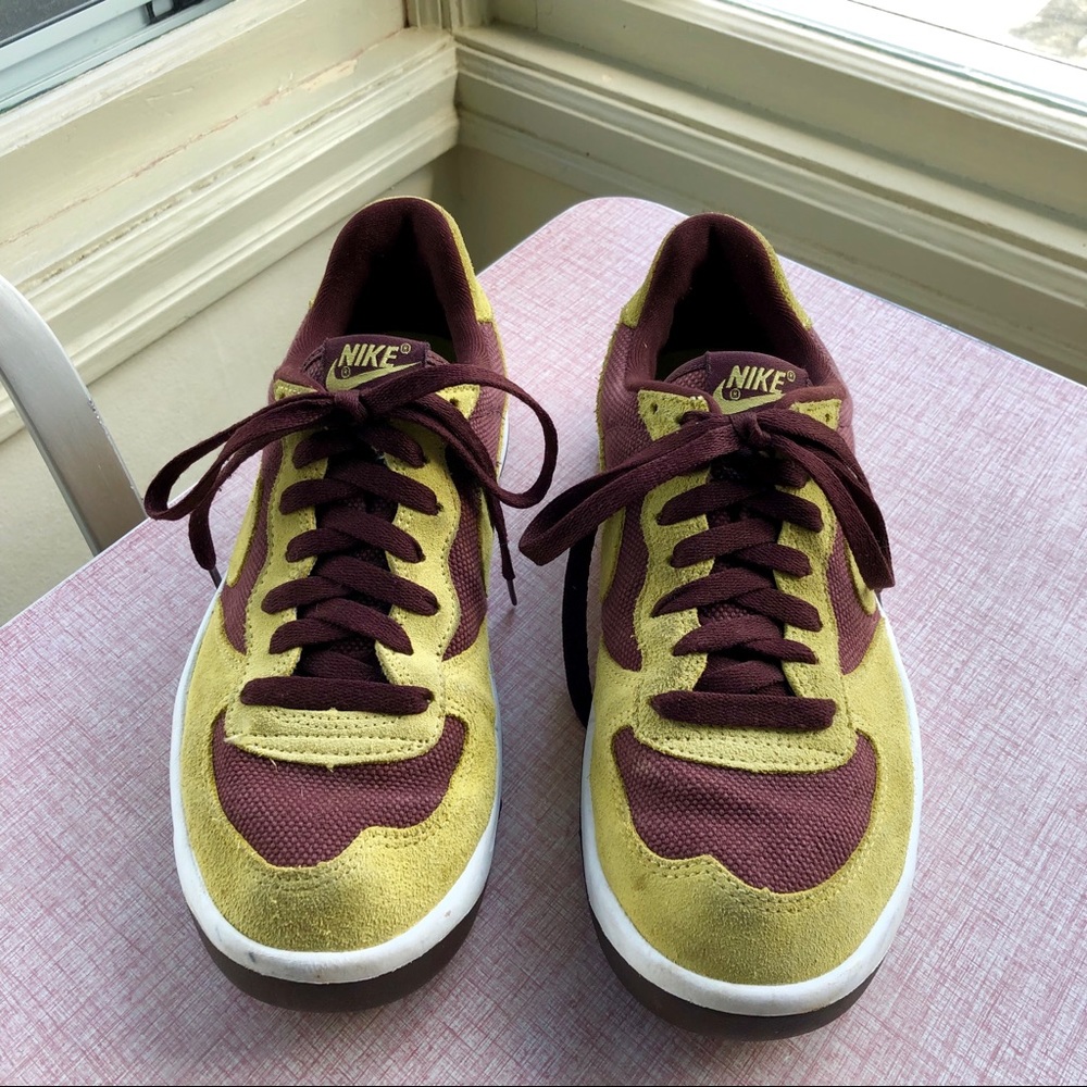 Nike yellow and maroon sneakers